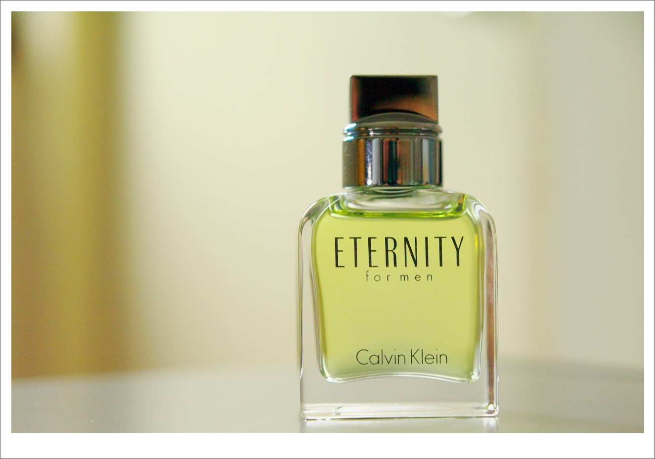 Eternity for Men by Calvin Klein Eau de Toilette in a clear glass bottle with silver cap, classic men’s fragrance with fresh aromatic scent.